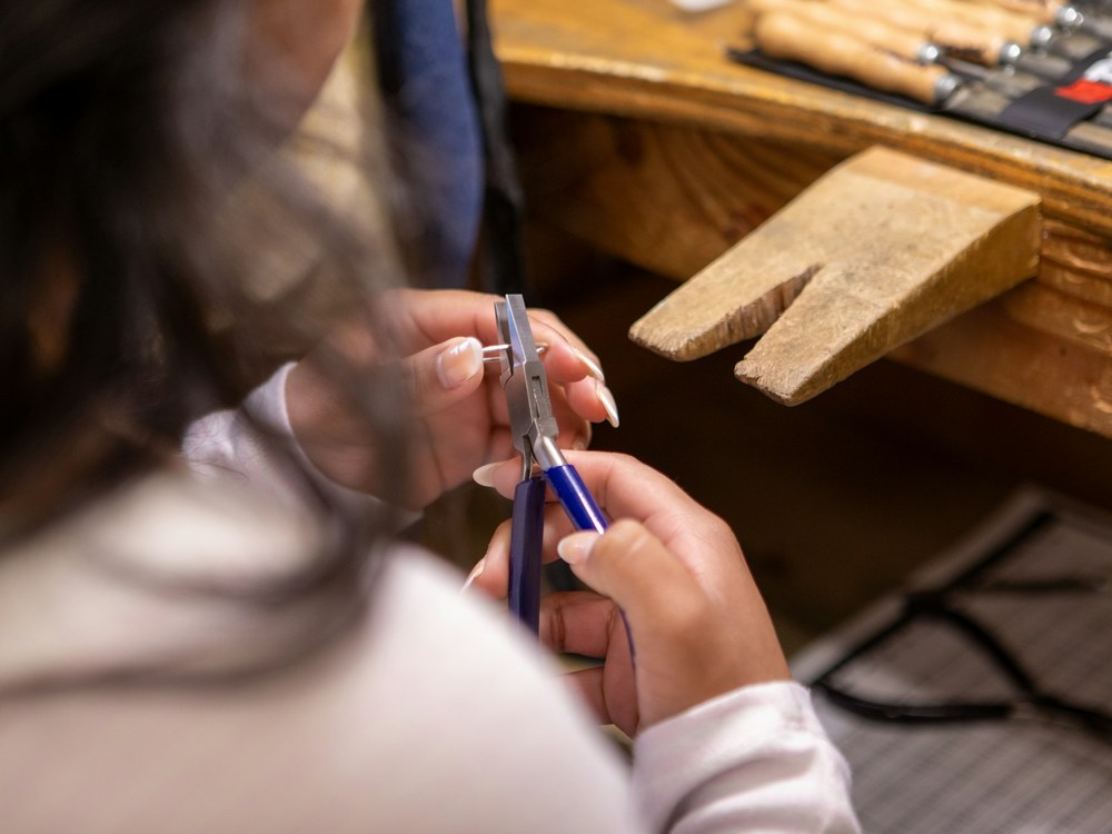 Workshop bench covered in jeweller's tools